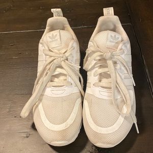 Girls Adidas white tennis shoes.  Gently used.